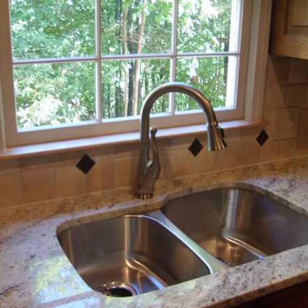 Undermount kitchen sink and faucet install from an Alpharetta GA bathroom remodel
